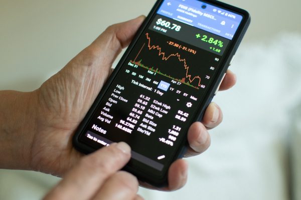 Man checking stock market trends